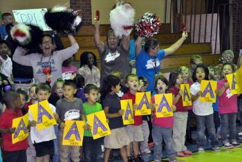 Seventh Ward students and teachers have a pep rally for their recent school performance grade of an "A."